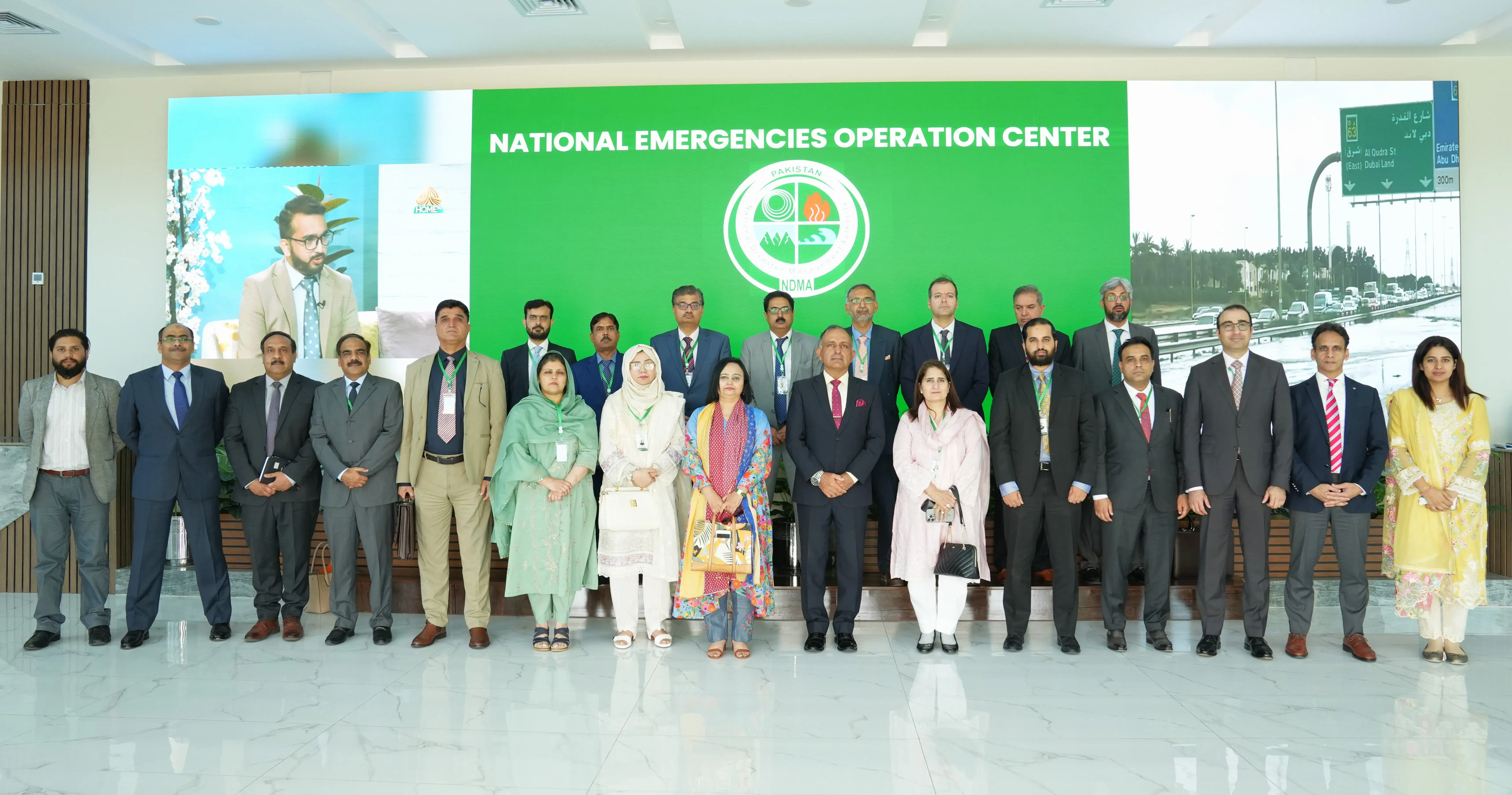 25-04-2024, Islamabad: Group Photo of Delegation of NIM Islamabad with Chairman NDMA Lt Gen Inam Haider Malik at NEOC, NDMA HQs